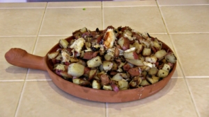 SmokingPit.com - Dungeness crab meat, bacon, garlic, green onion, gree pepper and postatoes fried with Creole seasoning. Yum!
