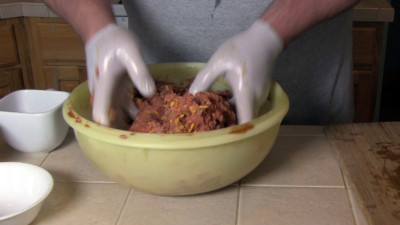 SmokingPit.com - Bacon Cheeseburger Meatloaf slow cooked on a Yoder YS640 Pellet cooker - Mixing the meat and egg.