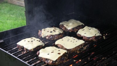 SmokingPit.com - Double Blue Cheese, Mushrooms & swiss Buffalo Burger grilled Santa Maria style on the Scottsdale by Arizona BBQ Outfitters. - Grilling the burgers on the Argentine grates.