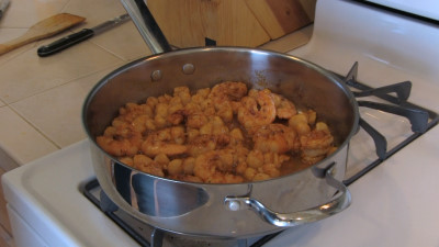 SmokingPit.com - Cajun Seafood Pizza recipe wood fire cooked on my Scottsdale Santa Maria style cooker. Sauteing the shrimp.