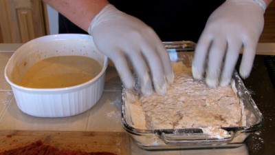 SmokingPit.com - Country Fried Steak & Gravy recipe wood fire cooked on my Scottsdale Santa Maria style cooker. Dredging the steak in Batter.