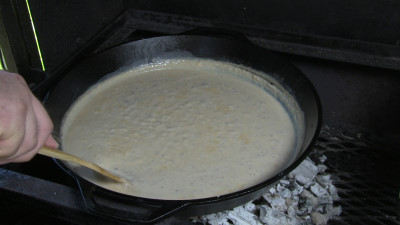 SmokingPit.com - Country Fried Steak & Gravy recipe wood fire cooked on my Scottsdale Santa Maria style cooker. Making the gravy.