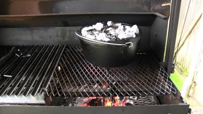 SmokingPit.com - Dutch oven Arroz Con Pollo cooked in a Lodge 12" dutch oven in my Scottsdale Santa Maria style cooker. Cut up chicken breast.