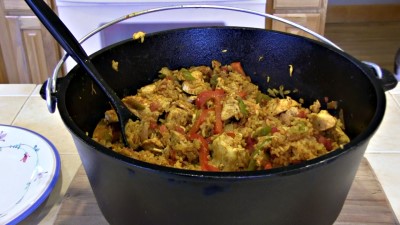 SmokingPit.com - Dutch oven Arroz Con Pollo cooked in a Lodge 12" dutch oven in my Scottsdale Santa Maria style cooker. Finished product.