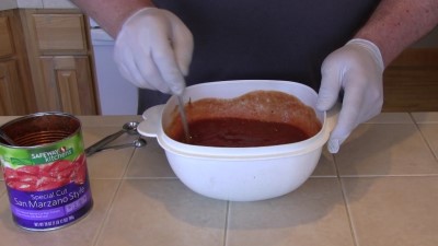 SmokingPit.com - Dutch oven Swiss Steak cooked in a Lodge 12" dutch oven in my Scottsdale Santa Maria style cooker. San Marzano style tomatoes.