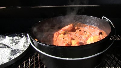 SmokingPit.com - Dutch oven Swiss Steak cooked in a Lodge 12" dutch oven in my Scottsdale Santa Maria style cooker. Finished Swiss Steak.
