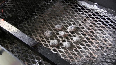 SmokingPit.com - Dutch oven Chocolate Pudding Cake cooked in a Lodge 10" dutch oven in my Scottsdale Santa Maria style cooker. Laying down 7 briquettes.