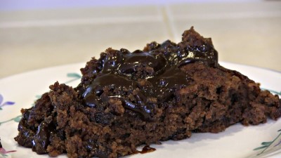 SmokingPit.com - Dutch oven Chocolate Pudding Cake cooked in a Lodge 10" dutch oven in my Scottsdale Santa Maria style cooker. Mixing the cake mix. The money shot!