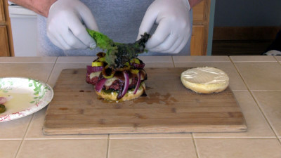 SmokingPit.com - Feta & Blue Cheese Burger - Cooked on the Yoder YS640 - Piling on the condiments.