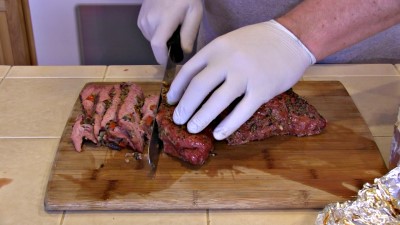 SmokingPit.com BBQ - Crimini Mushrooms, red onion, garlic sauteed in butter injected into a Beef Tri Tip roast. Carving the Tri Tip.