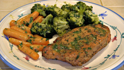 SmokingPit.com - Pork Loin Chops with a Herbed Honey Musterd Sauce.  Slow cooked on a Yoder YS640 Pellet cooker. The money shot!