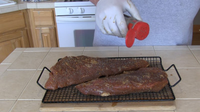 SmokingPit.com - Hoisin Marinated Tri-Tip Roast Beef  -  Slow smoked on a Yoder Wichita with Oak wok wood fire.  Seasoning the meat.