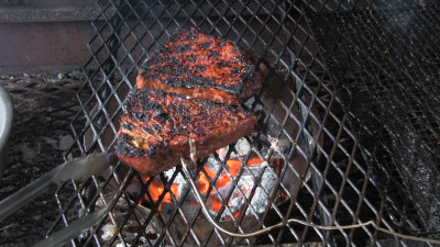 SmokingPit.com - Honey Ginger Flank Steak recipe wood fire cooked on my Scottsdale Santa Maria style cooker. Reverse sear.