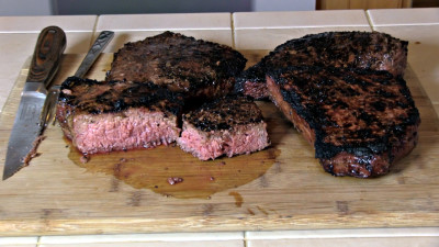 SmokingPit.com - Honey Ginger Flank Steak recipe wood fire cooked on my Scottsdale Santa Maria style cooker. The money shot!