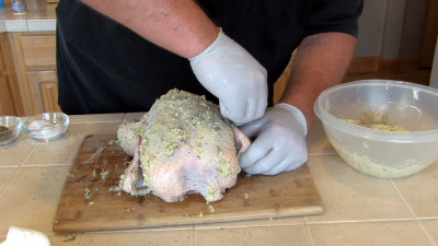 SmokingPit.com - Lemon Rosemary Chicken slow cooker on a Yoder YS640 Pellet cooker - Pinning the wings.