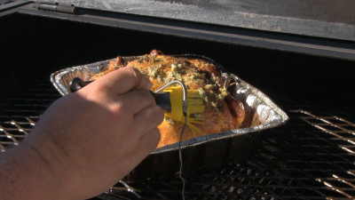 SmokingPit.com - Lemon Rosemary Chicken slow cooker on a Yoder YS640 Pellet cooker - Basting the bird.