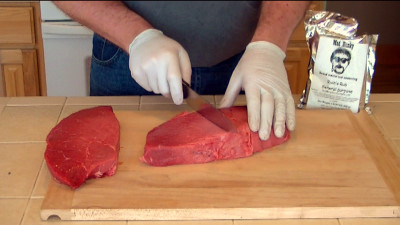 SmokingPit.com - Mesquite & Hickory Smoked Top Round Steak with Sauteed Mushrooms & Shrimp London Broil how to smoke cook videos on  slow cooking on the Yoder YS640 smoker & Traeger texas grill. - Cutting the meat.