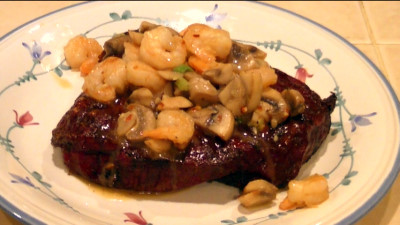 SmokingPit.com - Mesquite & Hickory Smoked Top Round Steak with Sauteed Mushrooms & Shrimp London Broil how to smoke cook videos on  slow cooking on the Yoder YS640 smoker & Traeger texas grill. - Shrimp on Steak