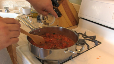 SmokingPit.com - Margherita Pizza recipe wood fire cooked on my Scottsdale Santa Maria style cooker. Making the sauce.