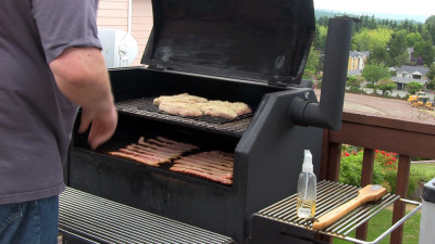 SmokingPit.com - Parmesan Encrusted Pork Loin Chops with fresh rosemary. Slow cooked on a Yoder YS640 Pellet cooker. Into the Yoder YS640.