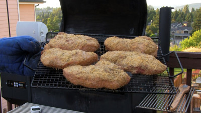 SmokingPit.com - Parmesan Encrusted Pork Loin Chops with fresh rosemary. Slow cooked on a Yoder YS640 Pellet cooker. Pulling chops at an internal temp of 145.