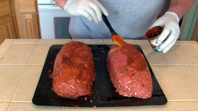 SmokingPit.com - Pepperoni Pizza Meatloaf slow cooked on a Yoder YS640 Pellet cooker - Mopping on the sauce.