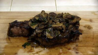 SmokingPit.com - Sous Vide MAd Hunky JAB Marinated Ribeye steaks - Mushrooms piled high.
