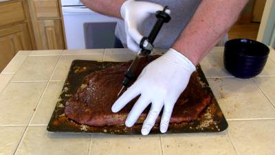 SmokingPit.com BBQ -Smoked Beef Brisket -  Beef recipes and how to videos on  slow cooking on the Traeger texas smoker grill.  Smoking meats information and Treager Pellets Tacoma WA Washinton SmokingPit.com