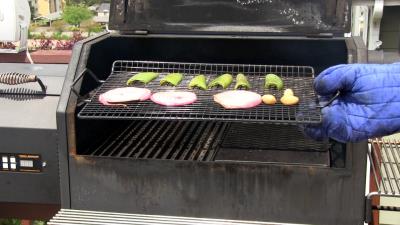 SmokingPit.com - Seared Tatonka Dust coated Buffalo Burgers  - Yoder YS640 cooked BBQ recipes & smoking meat tips and techniques. Roasting peppers.