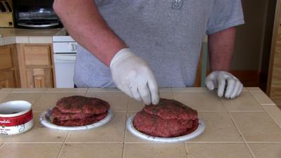 SmokingPit.com - Seared Tatonka Dust coated Buffalo Burgers  - Yoder YS640 cooked BBQ recipes & smoking meat tips and techniques. Adding Tatonka Dust.