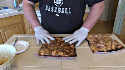 SmokingPit.com - Sesame Soy Chicken Wings.  Slow cooked on the yoder YS640. Marinating the wings.