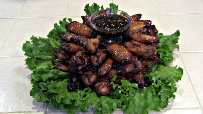 SmokingPit.com - Sesame Soy Chicken Wings.  Slow cooked on the yoder YS640. The money shot!