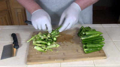 SmokigPit.com - Smoked Slamon Cream Cheese ABT's Recipe - Slow cooked on a Yoder YS640 Pellet smoker. - Slicing the Jalapeno peppers.