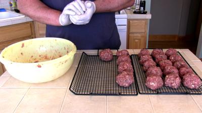 SmokingPit.com BBQ - Signature Apple Smoked Meatball Sub with a fresh tangy marinara. Forming the meatballs.