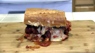 SmokingPit.com BBQ - Signature Apple Smoked Meatball Sub with a fresh tangy marinara. The money shot.