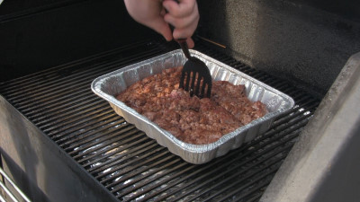 SmokingPit.com - Taco Casserole slow cooked on the yoder YS640. Browning the beef.