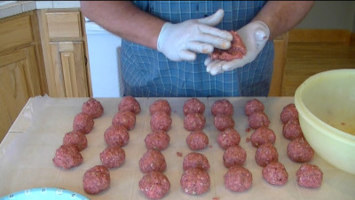 SmokingPit.com - Hickory smoked Teriyaki Beef Moink Balls with Pieneapple chunks smoked on a Traeger Texas pellet smoker. 