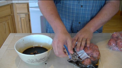 SmokingPit.com - Hickory smoked Teriyaki Beef Moink Balls with Pieneapple chunks smoked on a Traeger Texas pellet smoker. 