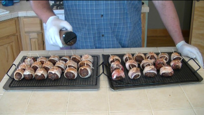 SmokingPit.com - Hickory smoked Teriyaki Beef Moink Balls with Pieneapple chunks smoked on a Traeger Texas pellet smoker. 