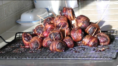 SmokingPit.com - Hickory smoked Teriyaki Beef Moink Balls with Pieneapple chunks smoked on a Traeger Texas pellet smoker. 