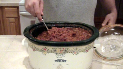 SmokingPit.com BBQ - My signature bowl of beans. Trippel Beer Infused Pulled Pork Chili smoked on a Yoder YS640 pellet smokerTop round beef steak smoked low and slow mixing the contents.