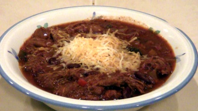 SmokingPit.com BBQ - My signature bowl of beans. Trippel Beer Infused Pulled Pork Chili smoked on a Yoder YS640 pellet smokerTop round beef steak smoked low and slow - Finished product.