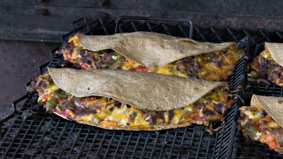 SmokingPit.com - Turkey Sausage Quesadilla recipe wood fire cooked on my Scottsdale Santa Maria style cooker. Fully cooked!