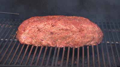 SmokingPit.com - Hickory Smoked Mad Hunky Meatloaf  -  Smoked low and slow on a Yoder YS640 smoker grill. Mouth watering moist, wood fire cooked! Adding crumbs. Tacoma WA Washington 