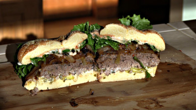 SmokingPit.com - Zesty Italian Onion burgers grilled over an Oak wood fire on the Scottsdale Santa Maria style cooker. 