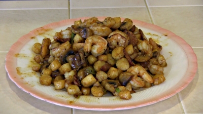 SmokingPit.com - Cajun Shrimp & Bay Scallops with a cajun butter sauce and mushrooms. Griddle cooked on a Yoder YS640 Pellet grill. The money shot.