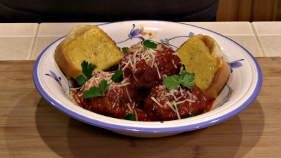 SmokingPit.com - Apple Wood Smoked Italian Meatballs in an authentic San Marzano Tomato Sauce. Smoked on a Yoder YS640. -  The money shot!