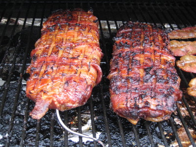 SmokingPit.com BBQ - Recipes and how to videos on maple mork sausage rolled up around Teriyaki checken, spices, veggies and slow cooked on the Traeger texas smoker grill.  smoking meats information and Treager Pelles Tacoma WA Washinton SmokingPit.com